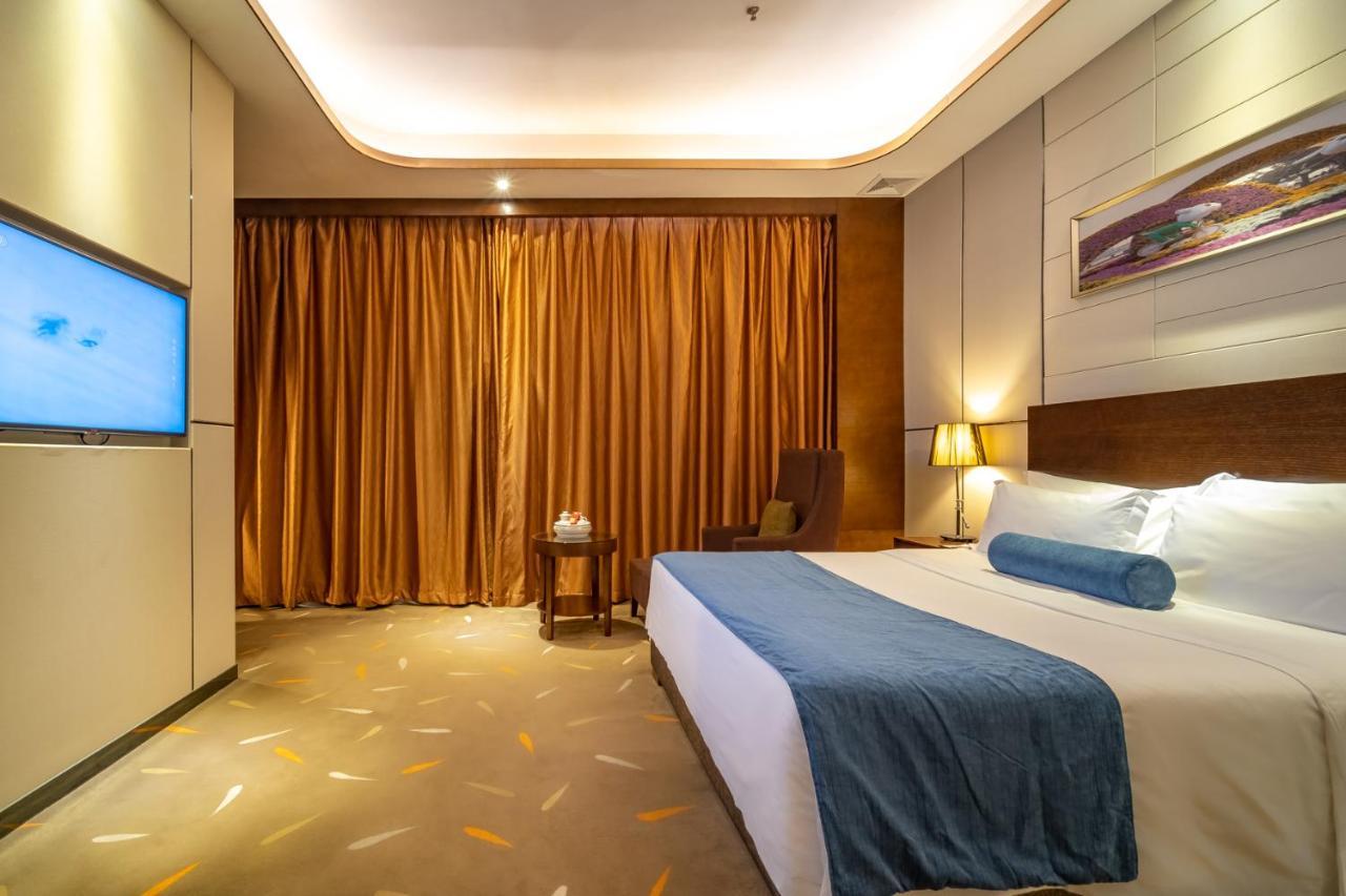 Relteem Hotel Жонгшан Екстериор снимка